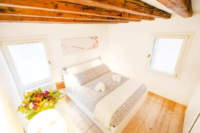 Letto o letti in una camera di Nel cuore del distretto dei Musei - design e stile