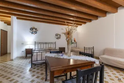 Letto o letti in una camera di Affittacamere Cà Marcello