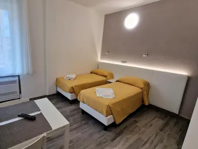 Letto o letti in una camera di Belfiore Alloggi Turistici