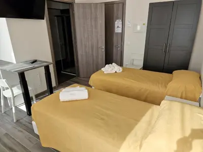 Letto o letti in una camera di Belfiore Alloggi Turistici