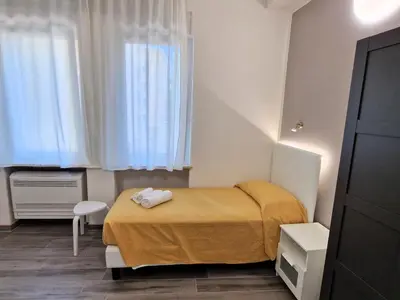Letto o letti in una camera di Belfiore Alloggi Turistici