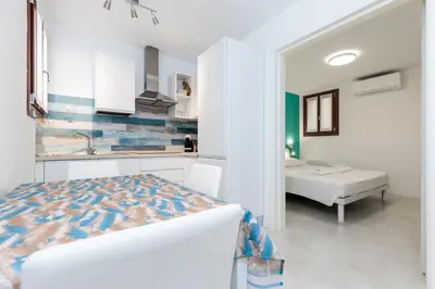 Letto o letti in una camera di Accogliente Monolocale Veneziano1 Aria Condizionata, vicino a campus e stazione