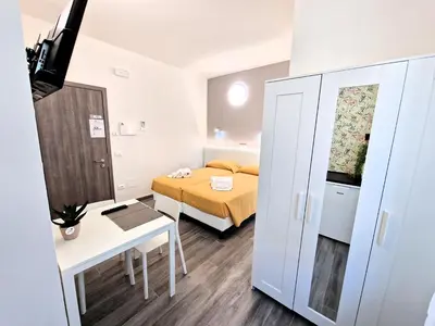 Letto o letti in una camera di Medici Alloggi Turistici