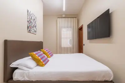 Letto o letti in una camera di R Gardenia House