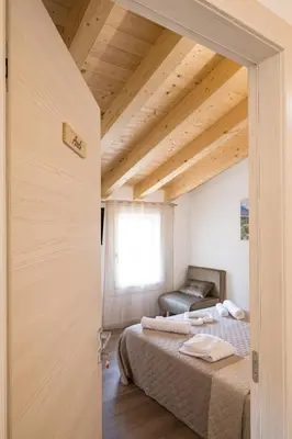 Letto o letti in una camera di Fienile Nonna Elide