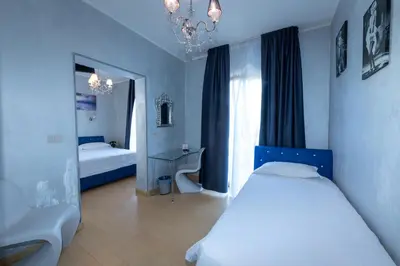Letto o letti in una camera di Blumarin
