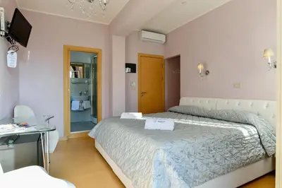 Letto o letti in una camera di Blumarin