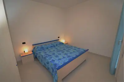 Letto o letti in una camera di Bright apartment surrounded by greenery