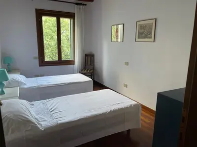 Letto o letti in una camera di Casa delle Rose-Appartamento Inge