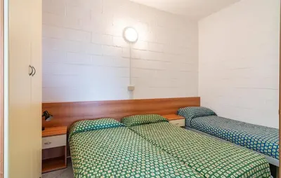 Letto o letti in una camera di Ca'gialla