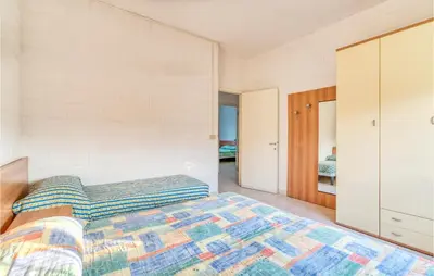 Letto o letti in una camera di Ca'bianca 2