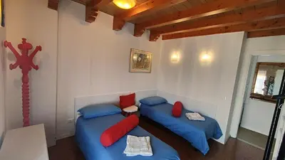 Letto o letti in una camera di Queen Home Beauty