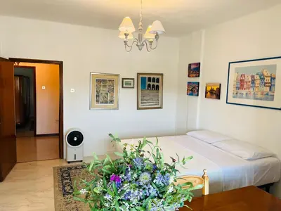 Letto o letti in una camera di Thalia Venezia appartamento accogliente