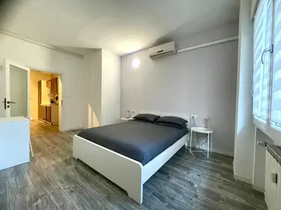 Letto o letti in una camera di Manuzio Suites Venezia - Free parking