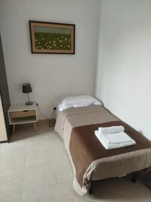 Letto o letti in una camera di Casa PATRIZIA