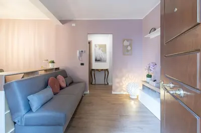 Cucina o angolo cottura di EnJoy Home - Appartamento elegante con giardino