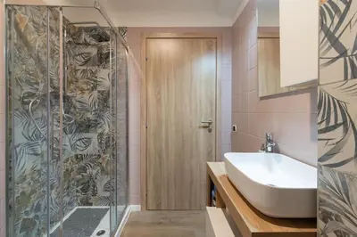 Bagno di EnJoy Home - Appartamento elegante con giardino