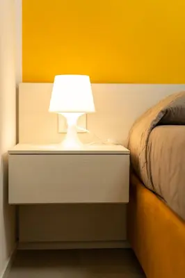 Letto o letti in una camera di Sun Village Residence con Piscina - Piazza Aurora - Adria Holiday Jesolo - FAMILY APARTMENTS