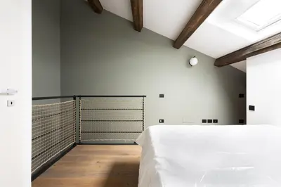 Letto o letti in una camera di Venice Penthouse - Loft with Canal View