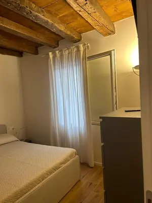 Letto o letti in una camera di Casa Milena