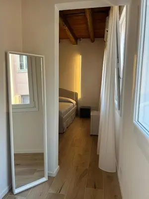 Letto o letti in una camera di Casa Milena
