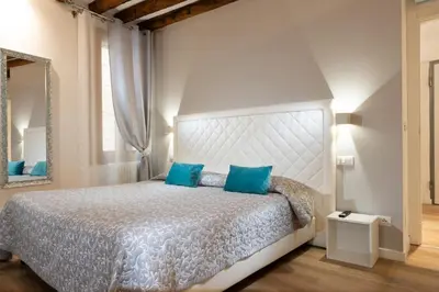 Letto o letti in una camera di Casa Tiziano2