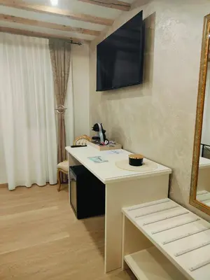 TV o dispositivi per l'intrattenimento presso Dal Doge - Guest House