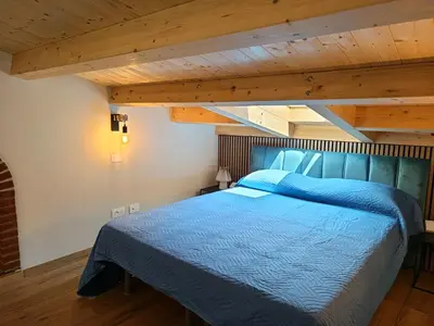 Letto o letti in una camera di La Scarpa della Strega