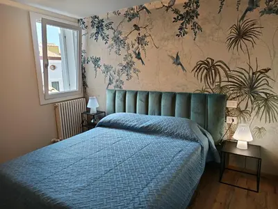 Letto o letti in una camera di La Scarpa della Strega