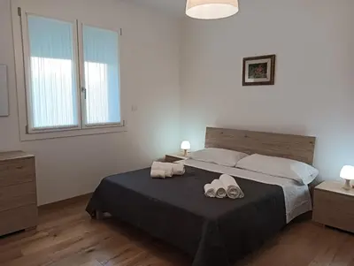 Letto o letti in una camera di Locanda vacanze da Emma
