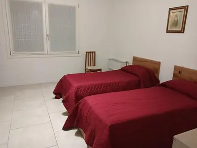 Letto o letti in una camera di Locanda vacanze da Emma