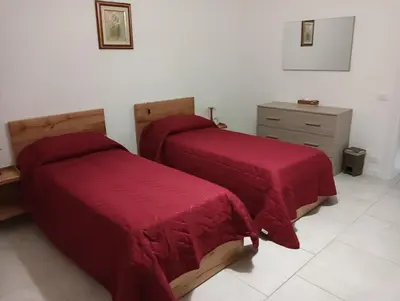 Letto o letti in una camera di Locanda vacanze da Emma