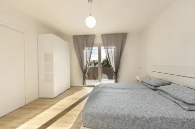 Letto o letti in una camera di Appartamento posizione strategica