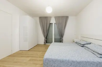 Letto o letti in una camera di Appartamento posizione strategica