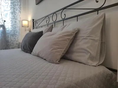 Letto o letti in una camera di Al Capitello