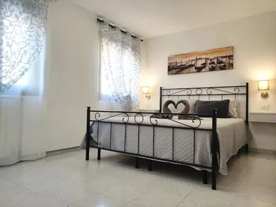 Letto o letti in una camera di Al Capitello