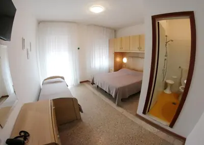 Letto o letti in una camera di Albergo Rosa