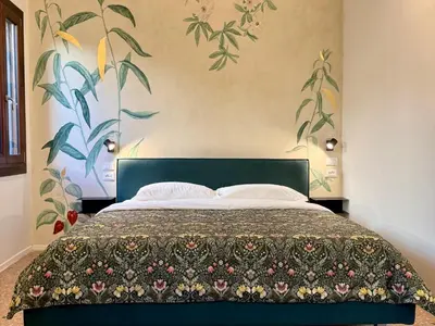 Letto o letti in una camera di QN Apartments