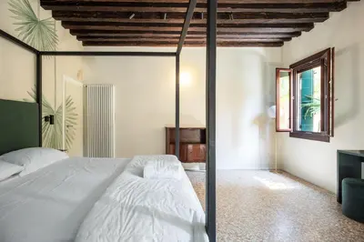 Letto o letti in una camera di QN Apartments