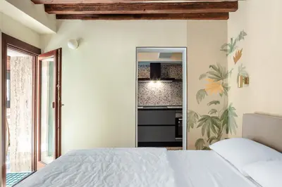 Letto o letti in una camera di QN Apartments