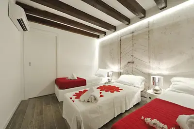 Letto o letti in una camera di Ca Forner - Cannaregio Apartment by Wonderful Italy