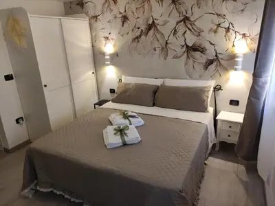 Letto o letti in una camera di Palazzo Carignano