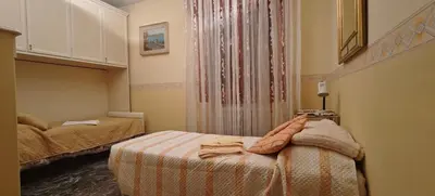 Letto o letti in una camera di Oasi Verde