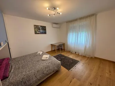 Letto o letti in una camera di Appartamento moderno Netflix & Free Parking