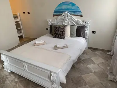 Letto o letti in una camera di Dimora Lisatti