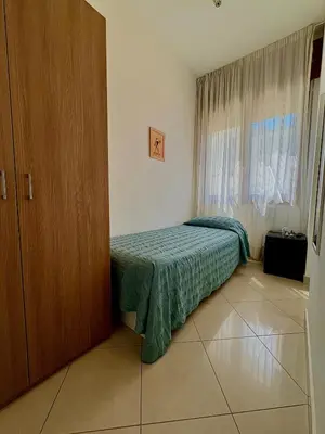 Letto o letti in una camera di Hotel Fortuna