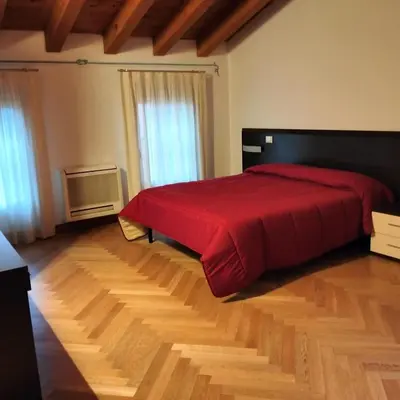 Letto o letti in una camera di Residence La Castellana