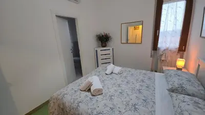 Letto o letti in una camera di Cinefestival Emerald Suite
