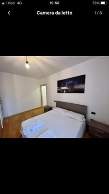 Letto o letti in una camera di Miniappartamento completo