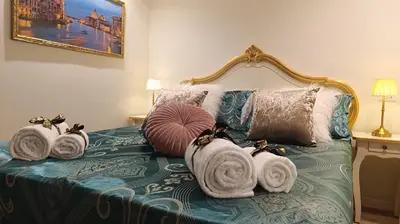 Letto o letti in una camera di Cupido Suite by Ca-Sa Check